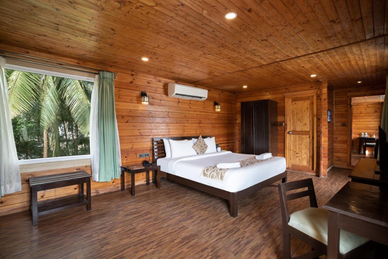 Stone Wood Riverfront Resort, Siolim Exterior photo